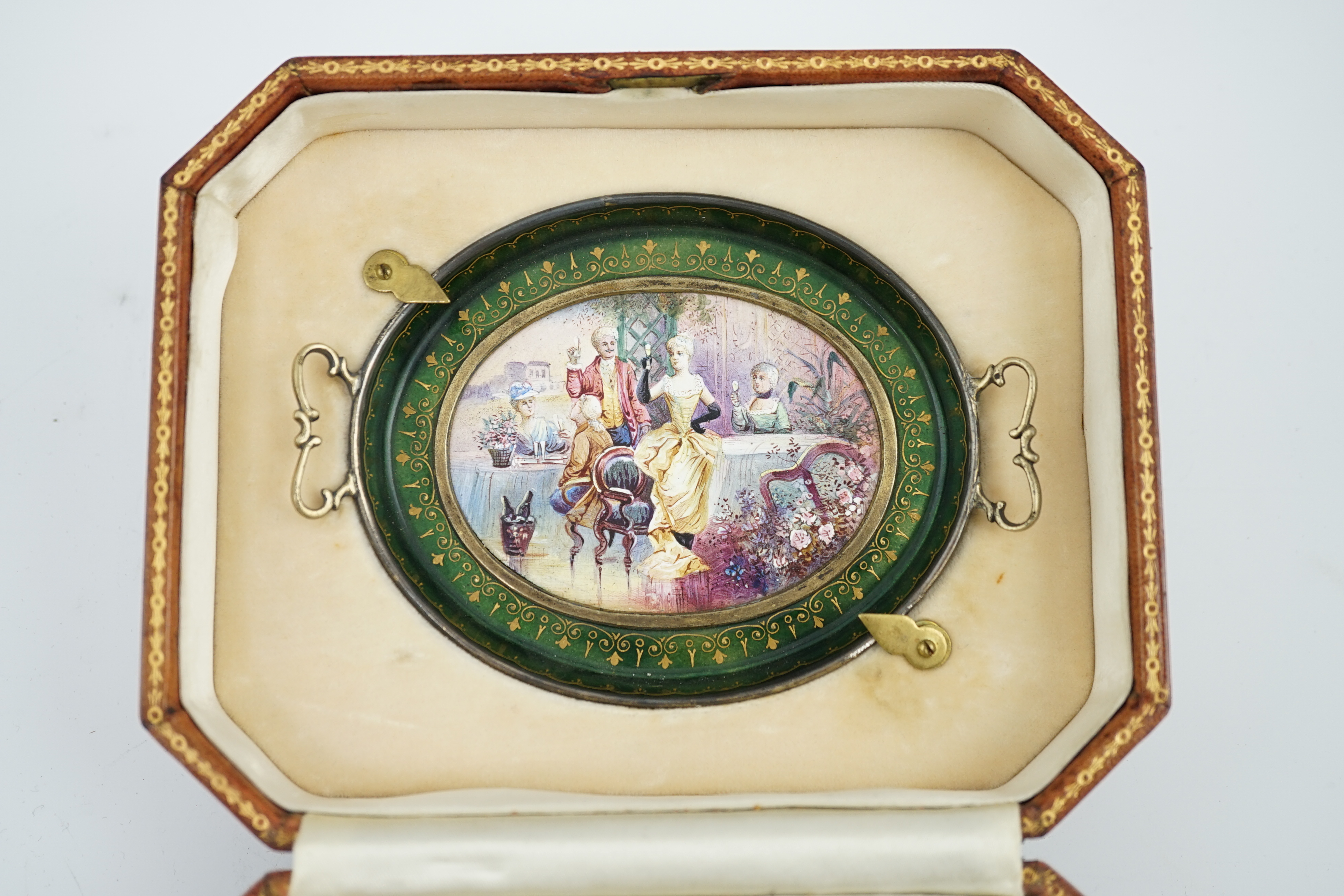 A cased late 19th century Viennese silver and polychrome enamelled miniature thirteen piece tea service, by Ludwig Politzer